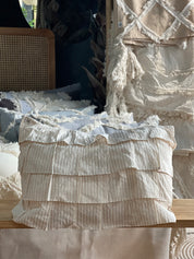 Cojín Rayas Palo Rosa Flecos