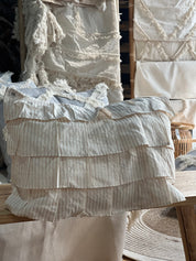 Cojín Rayas Palo Rosa Flecos